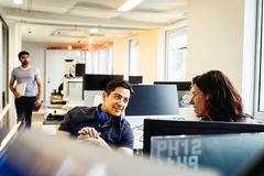 two people speaking